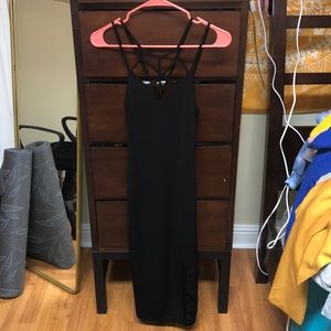 Right black dress with criss cross design on chest